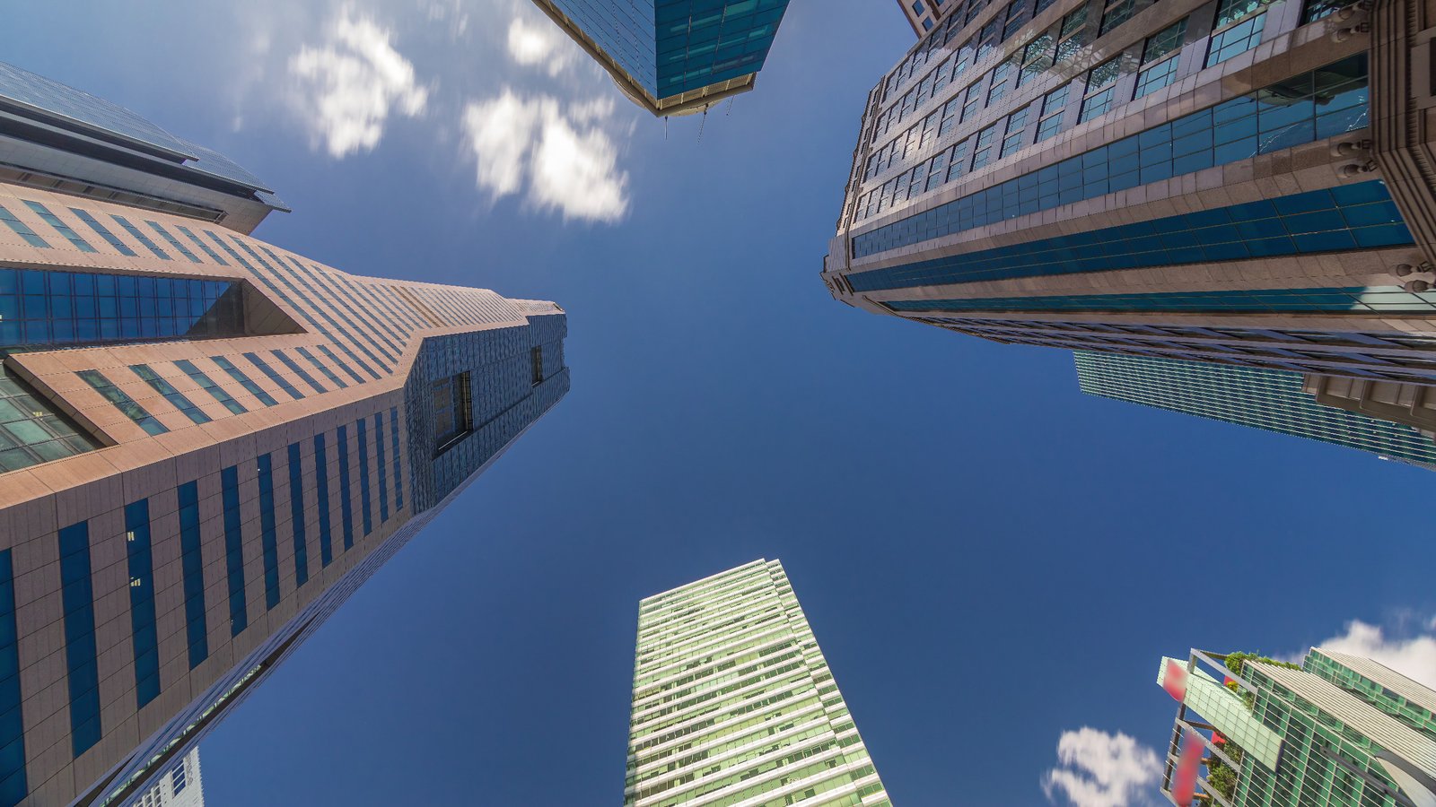 Modern Asian skyscrapers — representing the institutional standards Deltara operates to